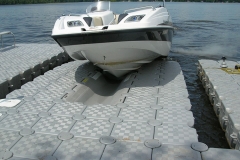 1000 Islands Docks Ltd. - Brockville Ontario - Jet Slide Modular Dock Installation with Boat Image